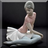C11. Lladro “Shelley” seated ballerina porcelain figurine. 